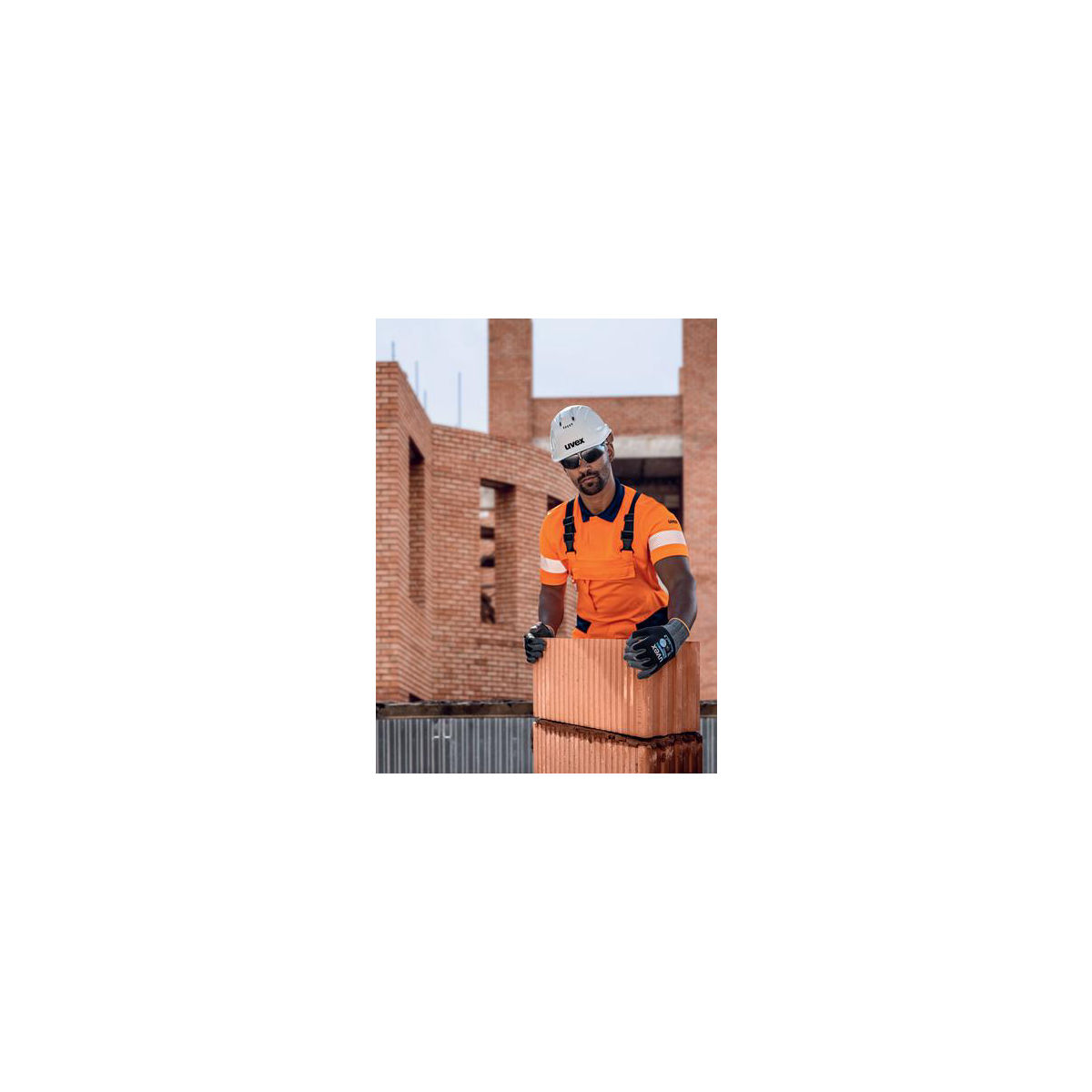 Latzhose uvex Construction orange/warnorange 48